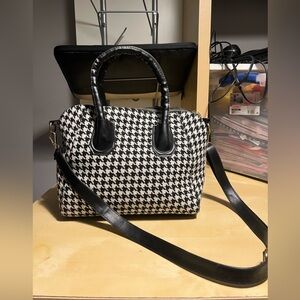 Black and white houndstooth purse. Used in good condition